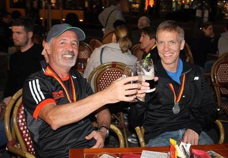 Mike Sohaskey and Herzel celebrating Berlin Marathon finish