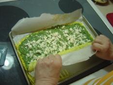 Greek Omelette Roll with Spinach Starting to roll it up