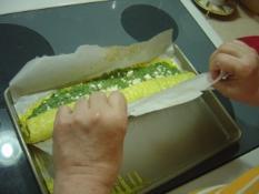 Greek Omelette Roll with Spinach Continuing to roll