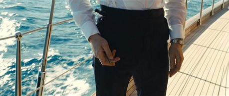 Skyfall – Bond’s Dark Blue Tuxedo in Macau Bond plays with his toys.