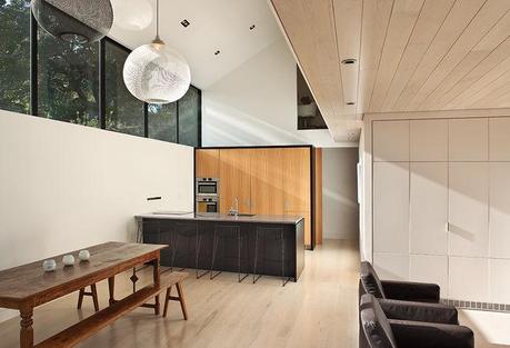 New Zealand home custom kitchen with american oak cabinets and whitened maple floors