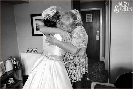 Lake District Wedding Photographer | Derwentwater Youth Hostel Wedding | Alternative eclectic wedding styling | Tux & Tales Photography | Bride Preparation | Bride hugs mum
