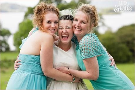 Lake District Wedding Photographer | Derwentwater Youth Hostel Wedding | Alternative eclectic wedding styling | Tux & Tales Photography | Party | Bride hugs bridesmaids