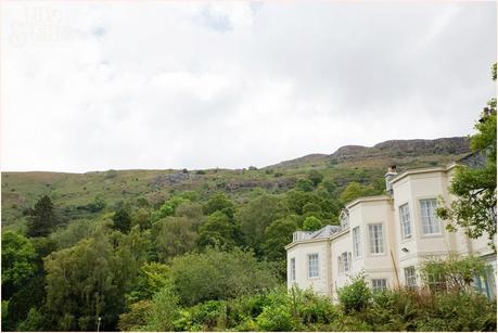 Lake District Wedding Photographer | Derwentwater Youth Hostel Wedding | Alternative eclectic wedding styling | Tux & Tales Photography | Bride Preparation | Exterior of Derwentwater Youth Hostel against the mountains