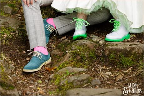 Lake District Wedding Photographer | Derwentwater Youth Hostel Wedding | Alternative eclectic wedding styling | Tux & Tales Photography | Bride & Groom Portraits in the Woods Near Waterfall | Cute shoes and clear boots
