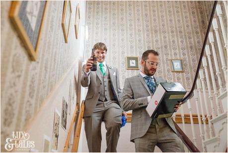 Lake District Wedding Photographer | Derwentwater Youth Hostel Wedding | Alternative eclectic wedding styling | Tux & Tales Photography | Groom Preparation | Groom and best man walk down stairs