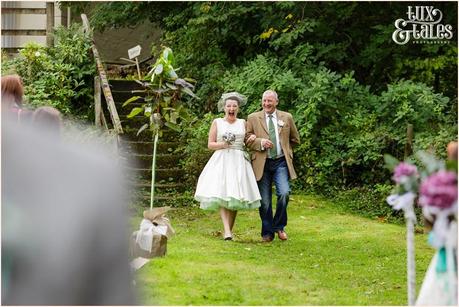 Lake District Wedding Photographer | Derwentwater Youth Hostel Wedding | Alternative eclectic wedding styling | Tux & Tales Photography | Ceremony | bride walks up aisle at outdoor wedding