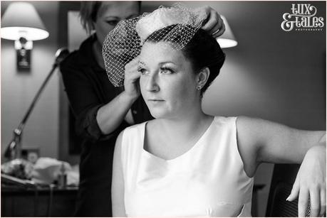 Lake District Wedding Photographer | Derwentwater Youth Hostel Wedding | Alternative eclectic wedding styling | Tux & Tales Photography | Bride Preparation | Putting on Pillbox hat