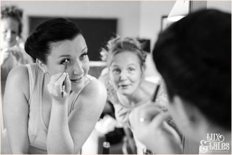 Lake District Wedding Photographer | Derwentwater Youth Hostel Wedding | Alternative eclectic wedding styling | Tux & Tales Photography | Bride Preparation | Friend makes silly faces in mirror