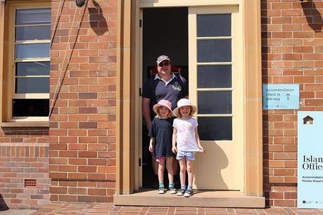 Hubby and the girls at the accommodation office on Cockatoo Island