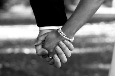 bride and groom, black woman white man holdinghands, the reporter and the gir,S.C Rhyne, black and white photo