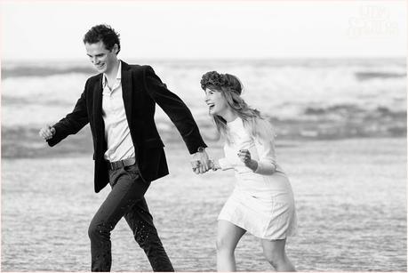 Photography Engagement Shoot in Whitby | Girl wearing Red Flower crown | Alterntive Couple whereing Vintage clothing | Laughing and running ont he beach