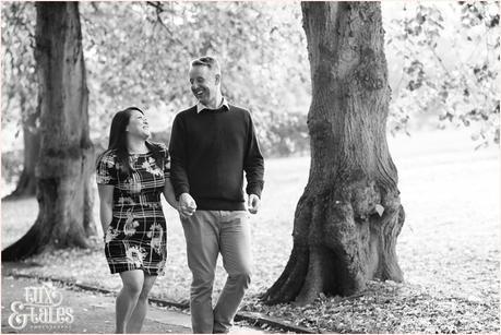 Engagement Shoot in Valley Gardens in Autumn | A couple have fun in the autumn leaves | Copyright Tux & Tales Photography