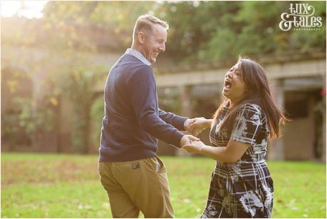 Engagement Shoot in Valley Gardens in Autumn | A couple have fun in the autumn leaves | Copyright Tux & Tales Photography