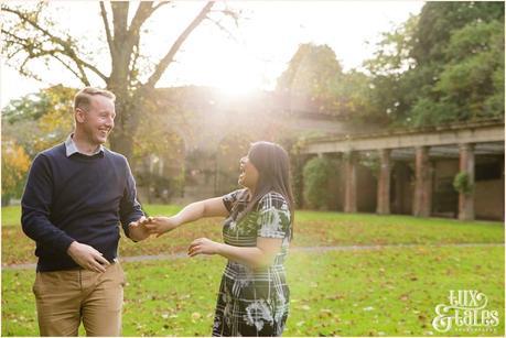 Engagement Shoot in Valley Gardens in Autumn | A couple have fun in the autumn leaves | Copyright Tux & Tales Photography