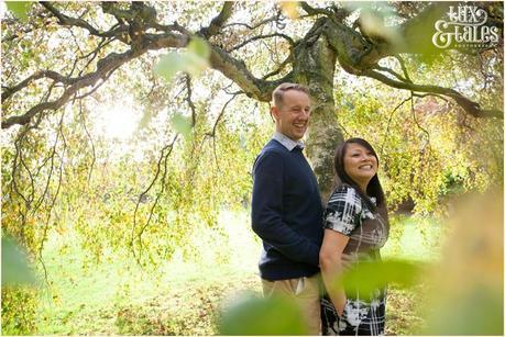 Engagement Shoot in Valley Gardens in Autumn | A couple have fun in the autumn leaves | Copyright Tux & Tales Photography