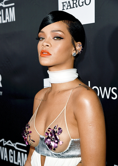 Rihanna Attends amFAR Awards