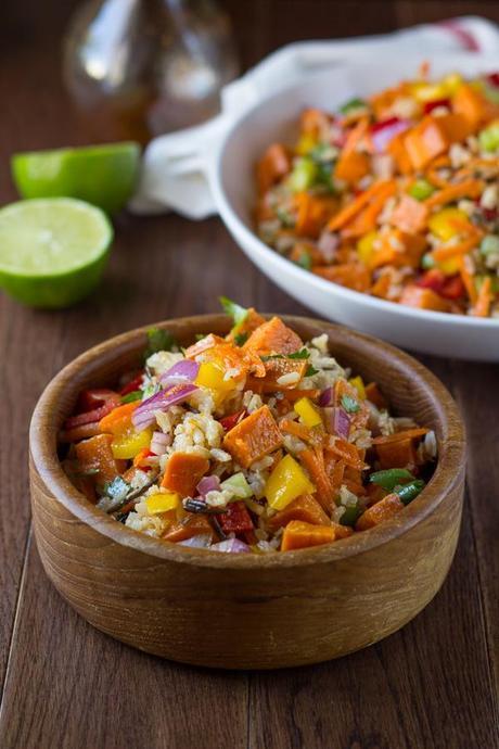 Roasted Sweet Potato Rice Salad with Chili Lime Vinaigrette- Roasted sweet potatoes, carrots, peppers, celery, onions and wild rice are tossed in a honey-chili-lime vinaigrette.