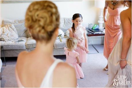 The Priory Cottages Wedding Photography Bride preparation daughter looking at mother