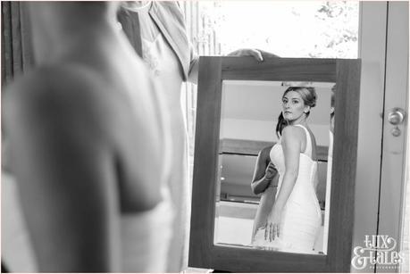 The Priory Cottages Wedding Photography Bride preparation looking at reflection
