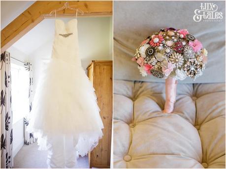 The Priory Cottages Wedding Photography Bride preparation dress and brooch bouquet