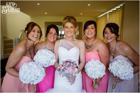 The Priory Cottages Wedding Photography Bride preparation portrait with bridesmaids