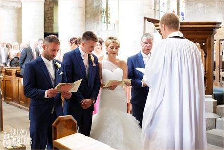 Leeds church wedding photography bride & groom singing hymns