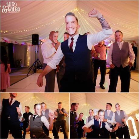 The Priory Cottages Wedding Photography Leeds - Groomsmen dance wearing groom mask - silly dance