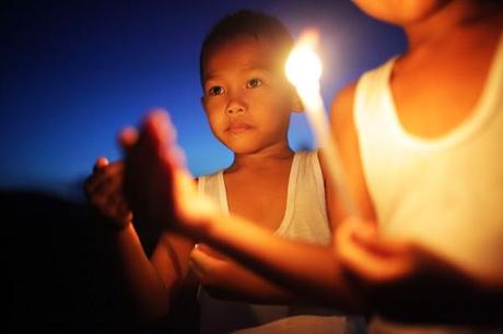 Lighting candles for the dead