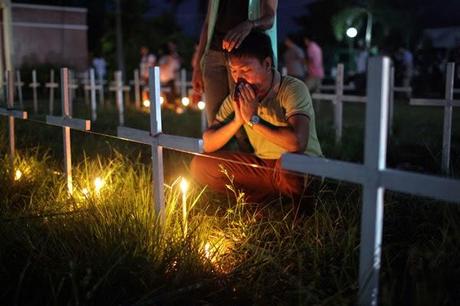 Lighting candles for the dead