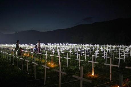 Lighting candles for the dead