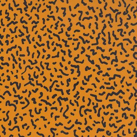 Modern laminates like Ettore Sottsass Memphis pattern by Abet Laminati in black and orange