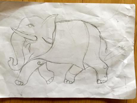An elephant that I saw crumpled up on the ground 