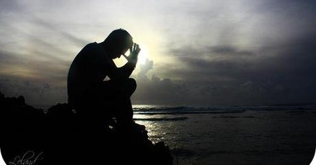 Man Praying Near Water