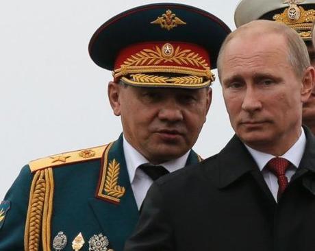 Sergei Shoigu (l) and Vladimir Putin (r)