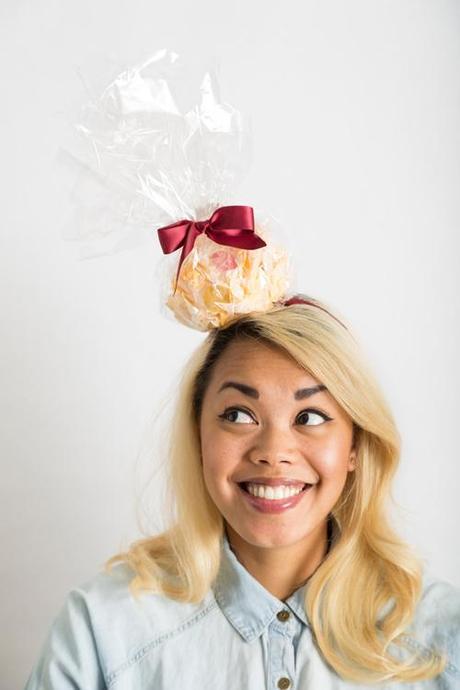 Start a new tradition of making hats for each other to wear on Thanksgiving like this popcorn ball fascinator.