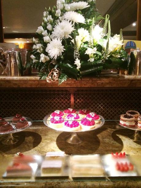 cake and flower display pastries chocolates tarts at bettys tea room cafe york