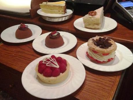 chocolate bomb engadine torte raspberry white chocolate tart strawberry paris-brest cakes at bettys tea room cafe yrok