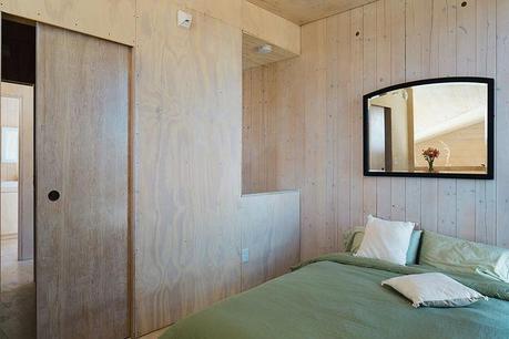 Modern prefab vacation home in Washington bedroom with just the basics