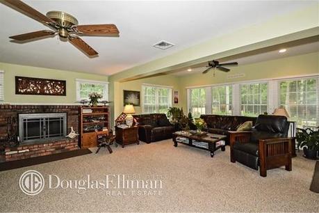 family room with furniture lined along the perimeter