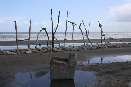 Hokitika - Driftwood sign on the beach - plus couch