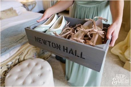 Bride Preparation Photography at Newton Hall beachside wedding | Crate of shoes