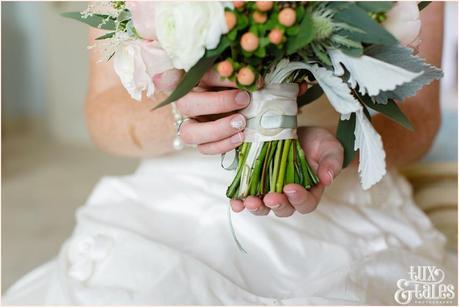 Bride Preparation Photography at Newton Hall beachside wedding | shell bouquet details