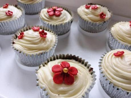 winter floral ruby red flower cupcakes with vanilla icing swirl for wedding anniversary