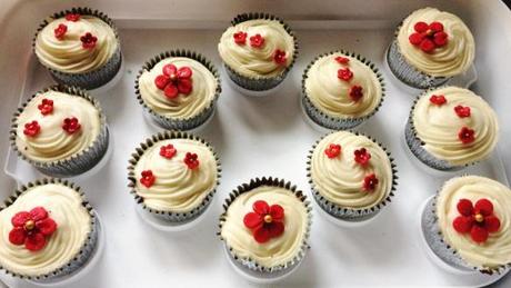 ruby red flower cupcakes with edible glitter vanilla buttercream swirl for wedding anniversary celebration