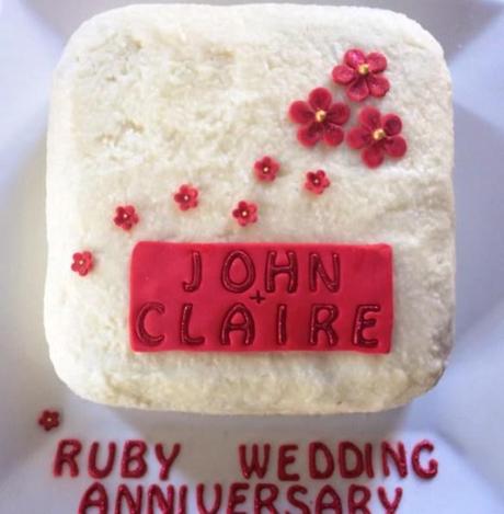 john and claire ruby wedding anniverary cake tropical fruit christmas cake with coconut icing and red decorations