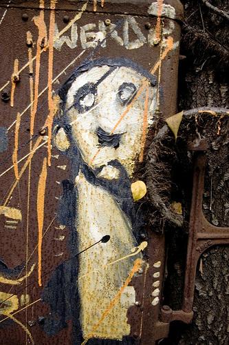 character on iron in the woods