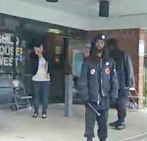 Billy cub-wielding Black Panthers at a Philadelphia polling station, 2008