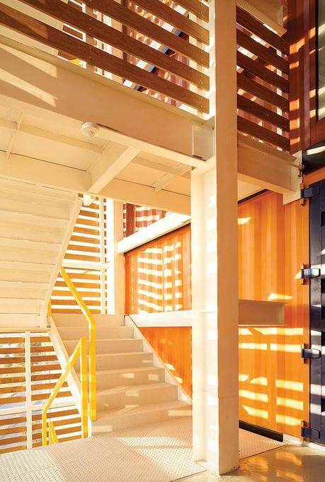 Prefab housing unit in Mexico made of shipping containers with wood staircase