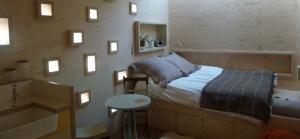 quirky accommodation with canopy and stars brockloch-treehouse_double-bed_cs_gallery_preview